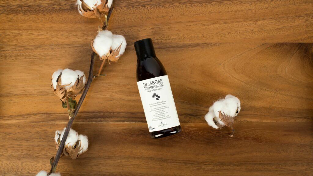 huile massage bébé avec coton